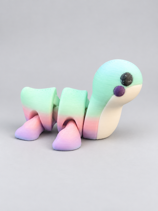 Pastel articulated long-neck dinosaur with mint, pink, lavender, and cream colors