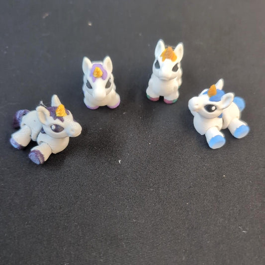 Baby unicorn minis shown in several pastel color combinations