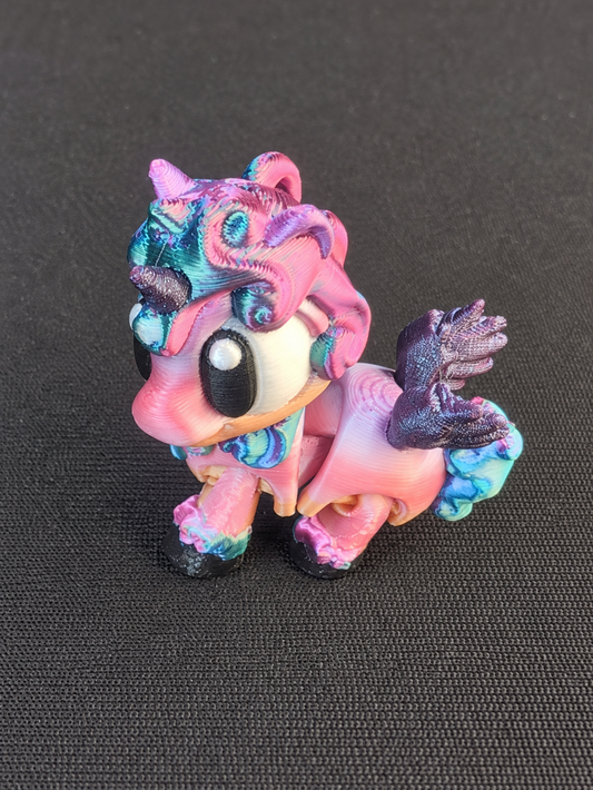 Cleaned product photo of a pre-made multicolor mini unicorn