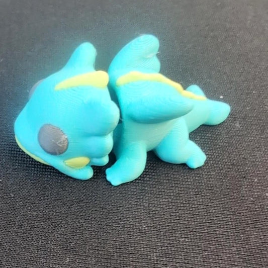Mini 3D-printed water dragon in aqua and yellow